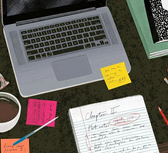 Workspace with laptop and notebooks